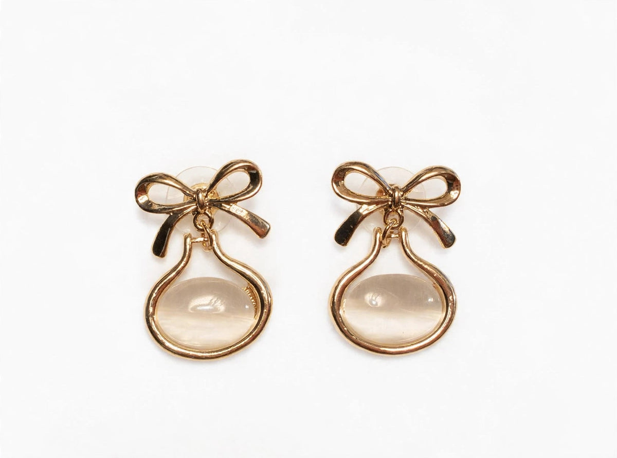 Coquette Bow Drop Studs - Gold Bow with Milky Oval | M&M by Sana Ashraf