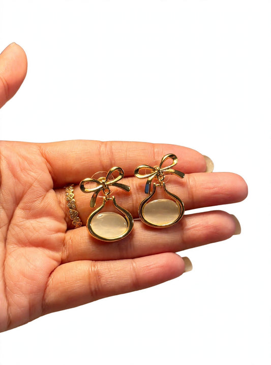 Coquette Bow Drop Studs - Gold Bow with Milky Oval | M&M by Sana Ashraf